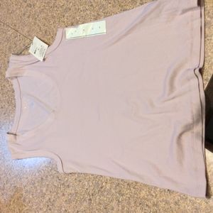 A New day tank. Light purple. Size medium. Scoop neck. New with tags
